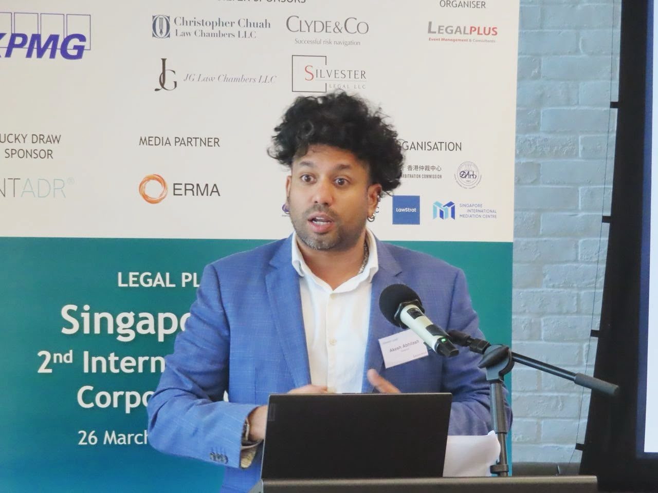 Akesh Abhilash speaking at the LegalPlus Singapore and Southeast Asia Conference 2026
